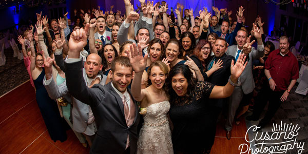 Group photo of attendees of a wedding
